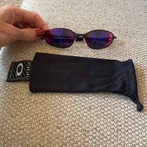 Rare Oakley Sunglasses with Red lenses and gunmetal frame